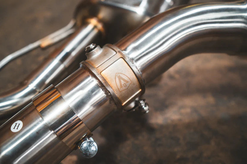 BMW M240i G42 Valved Sport Exhaust System Closeup Logo