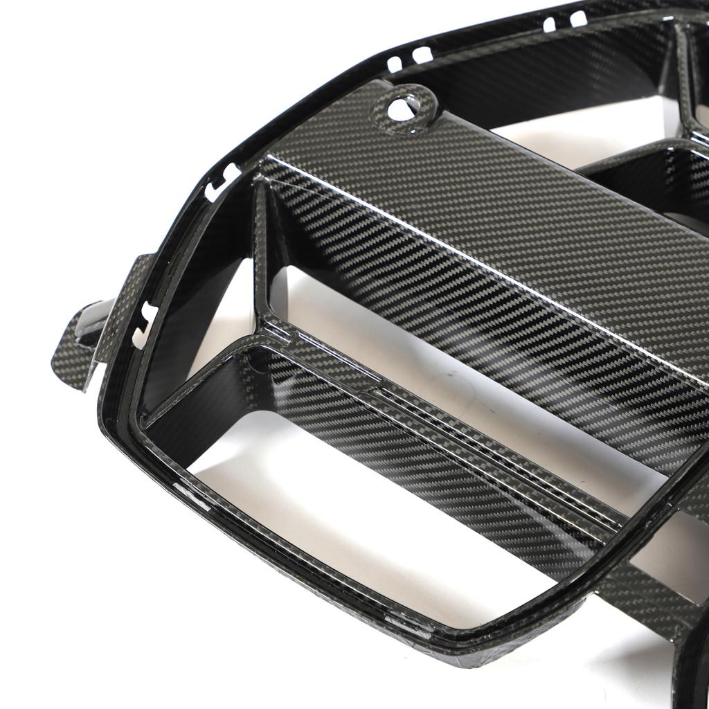 Side view of the CSL Style Dry Carbon Fiber Front Kidney Grille for BMW G80/G82