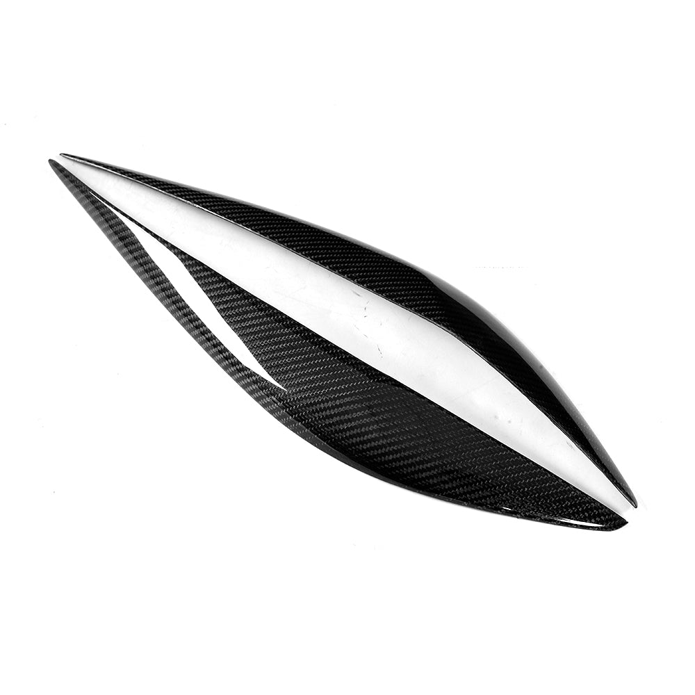 Closeup of one Carbon Fiber Headlight Eyelids for BMW F30 & BMW F80