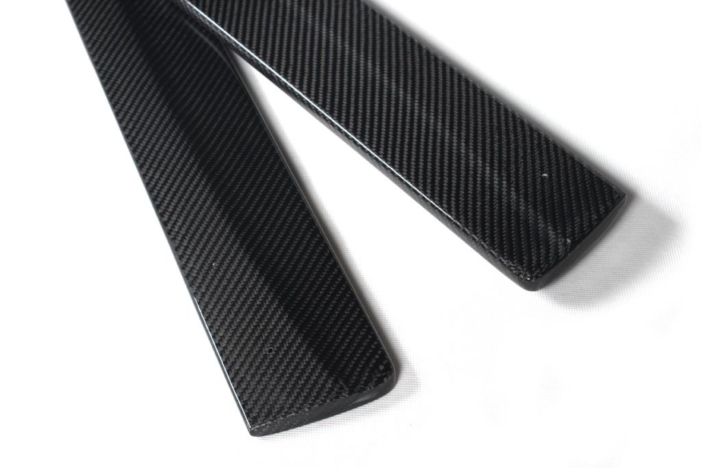 Closeup of one side of the Carbon Fiber Side Skirts for BMW F32
