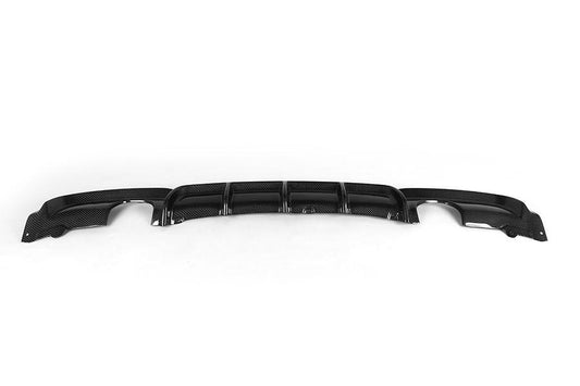 A black carbon fiber diffuser for BMW F30 with a quad exhaust and dual outlet design.