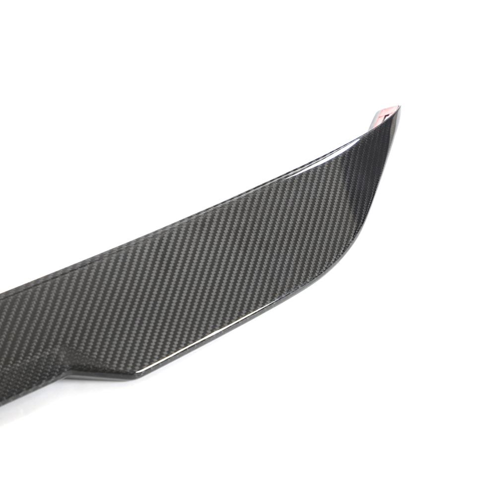 Close up detail of MP Style carbon fiber trunk spoiler weave on BMW G87.