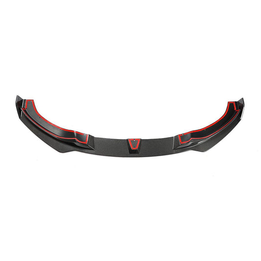 A carbon fiber front lip designed for BMW F32, featuring a black weave pattern with red accents along the lower edge.