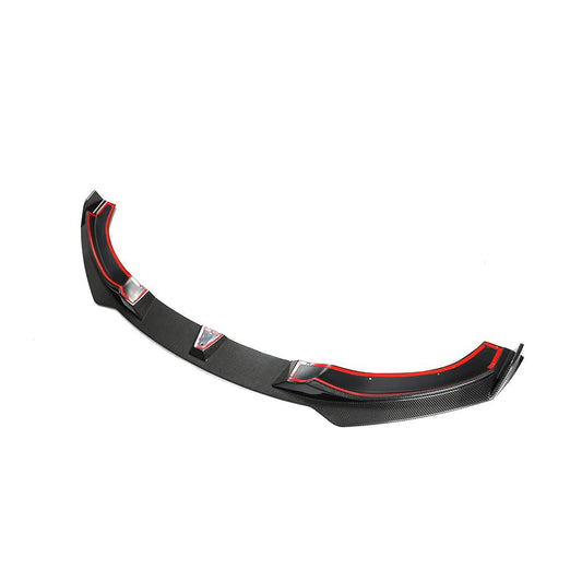 A carbon fiber front lip designed for BMW F32, featuring a black weave pattern with red accents along the lower edge.