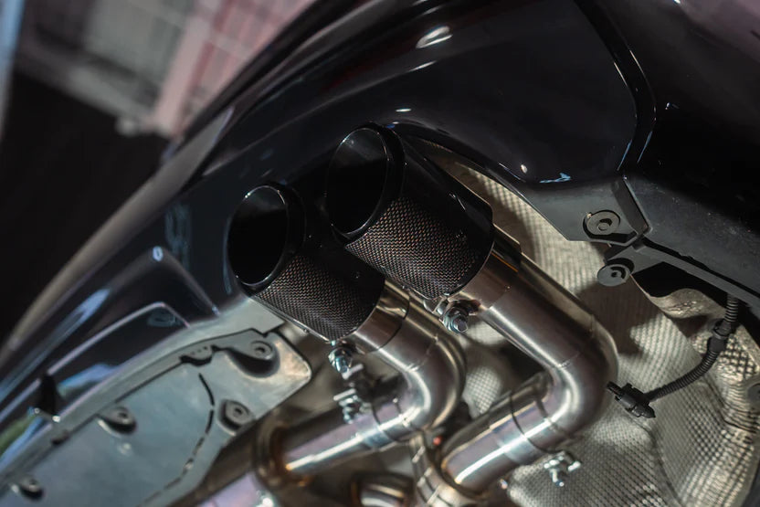 Installed view of the carbon tips with the chrome Valvetronic BMW G30 530i / 540i Valved Sport Exhaust system