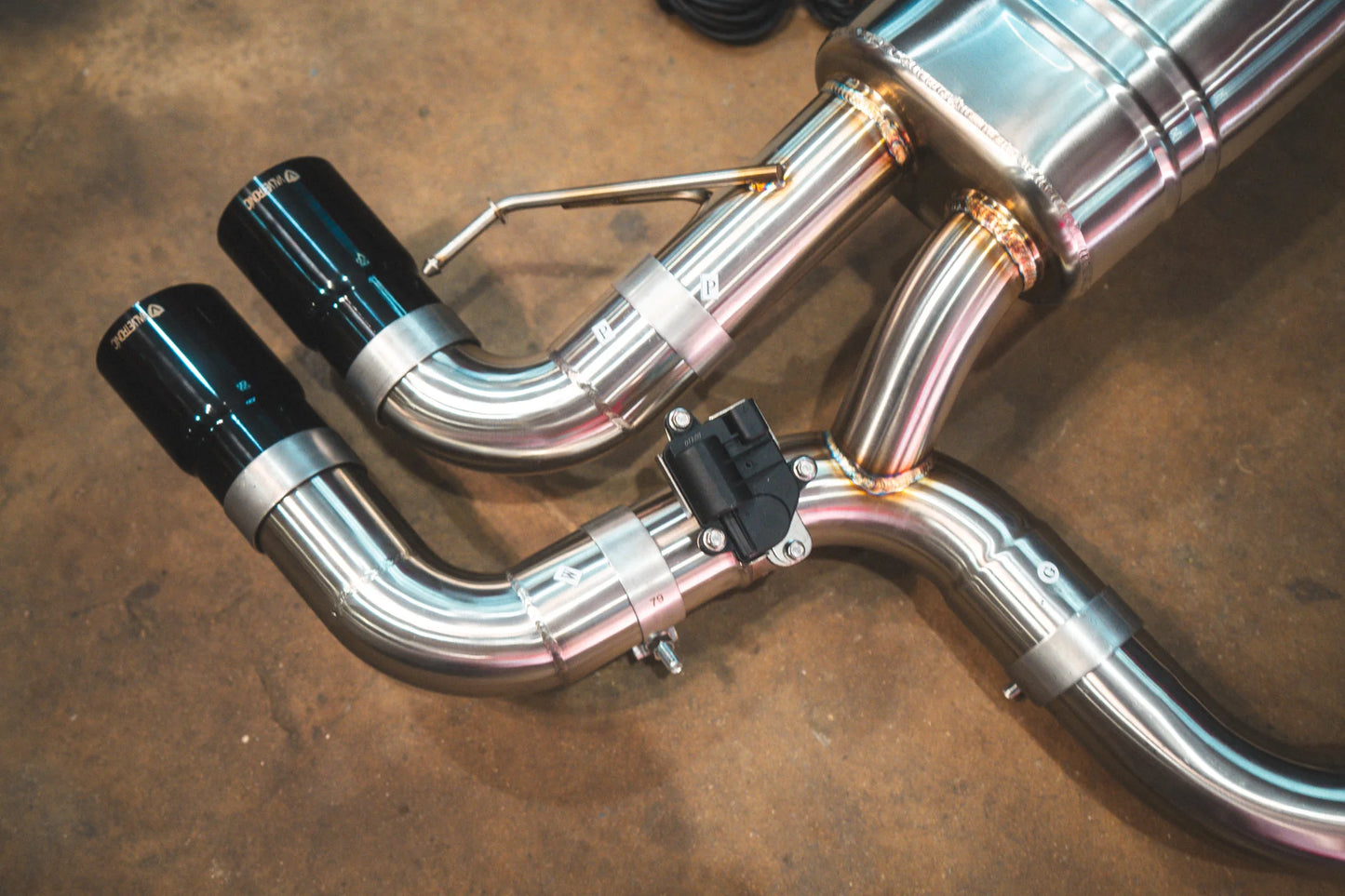 Another view on the Valvetronic BMW G30 M550I Valved Sport Exhaust System with black tips in chrome