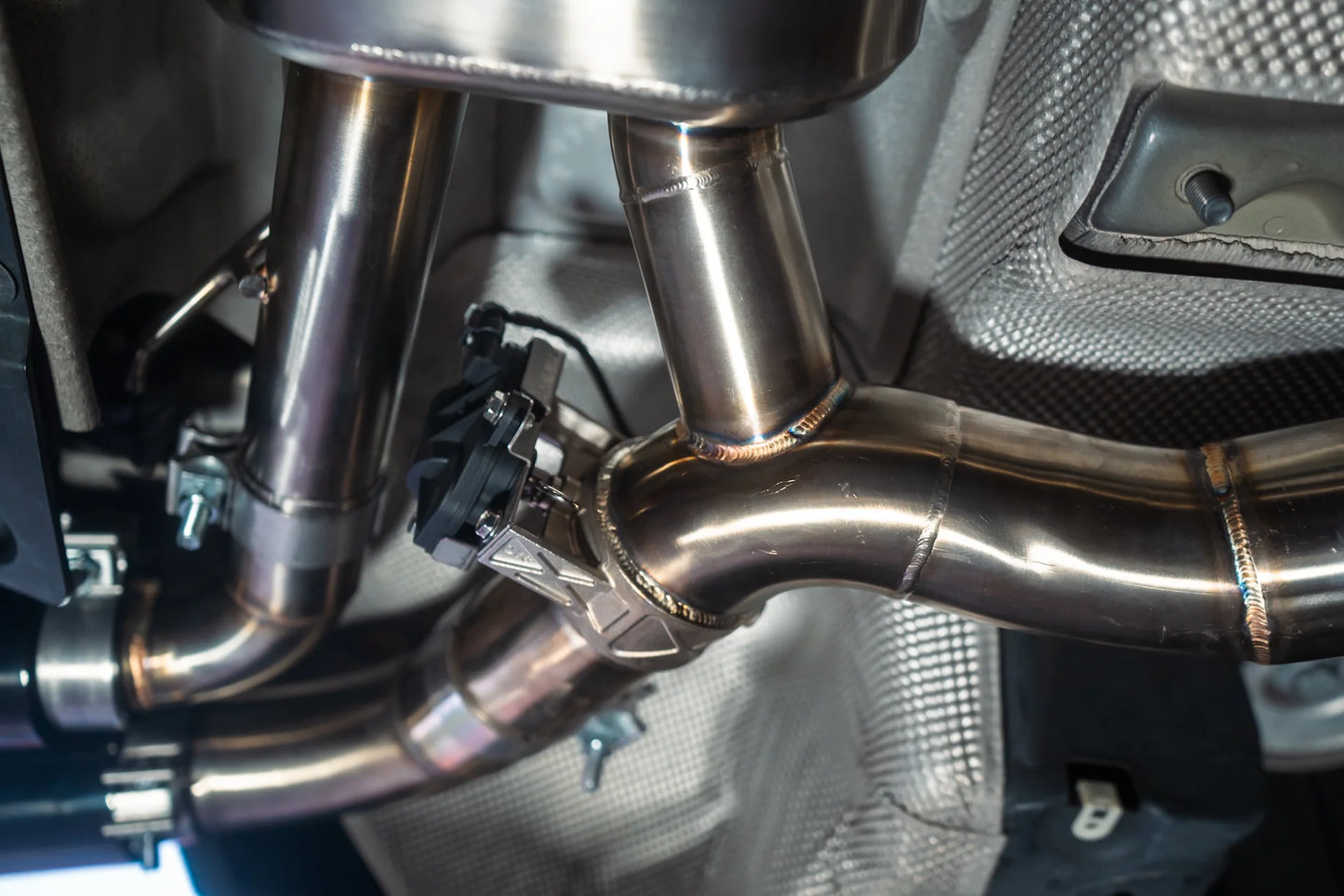 Chrome Welding installed on the Valvetronic BMW G30 M550I Valved Sport Exhaust System