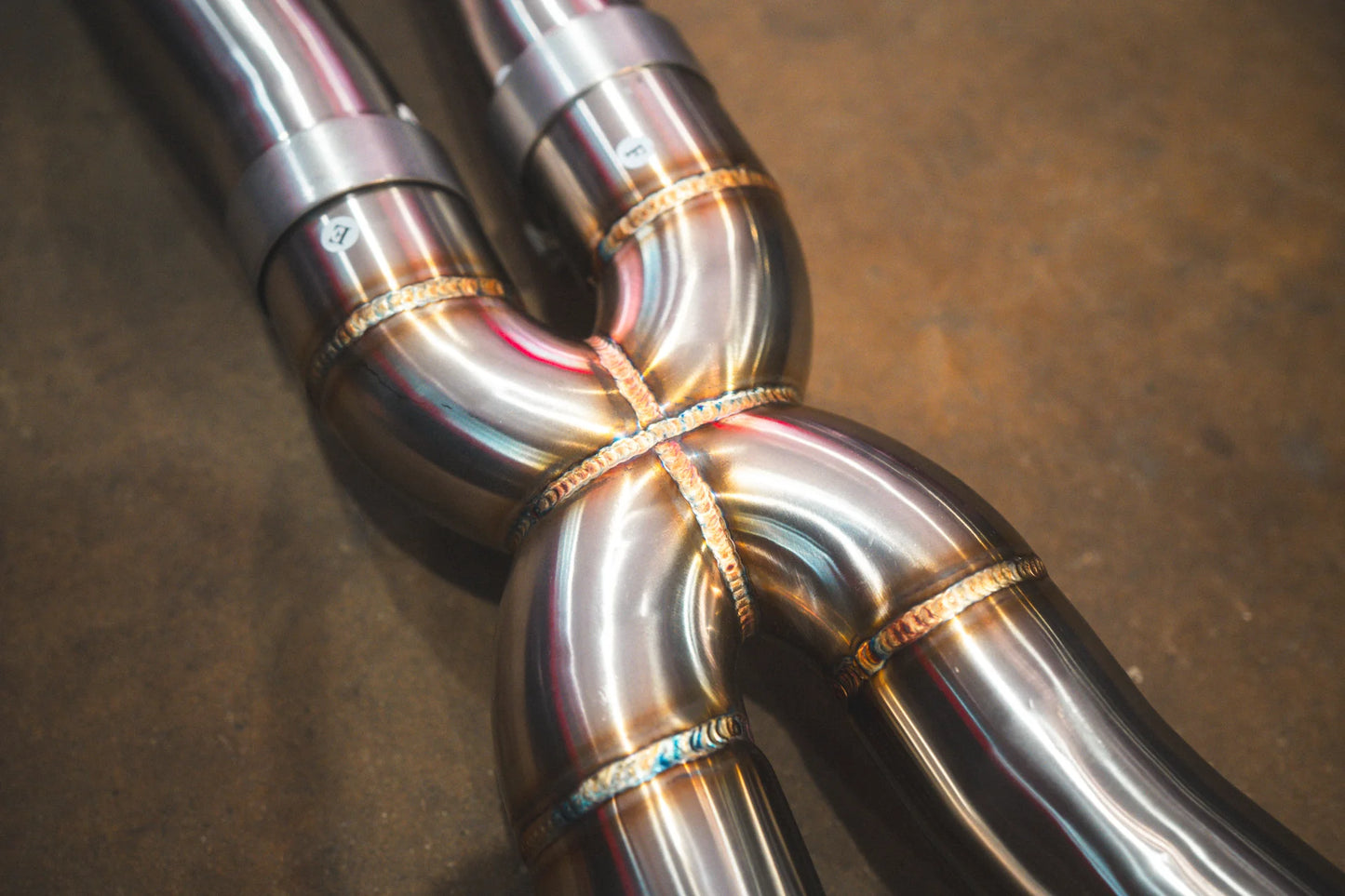 Closeup of the welding on the Valvetronic BMW G30 M550I Valved Sport Exhaust System