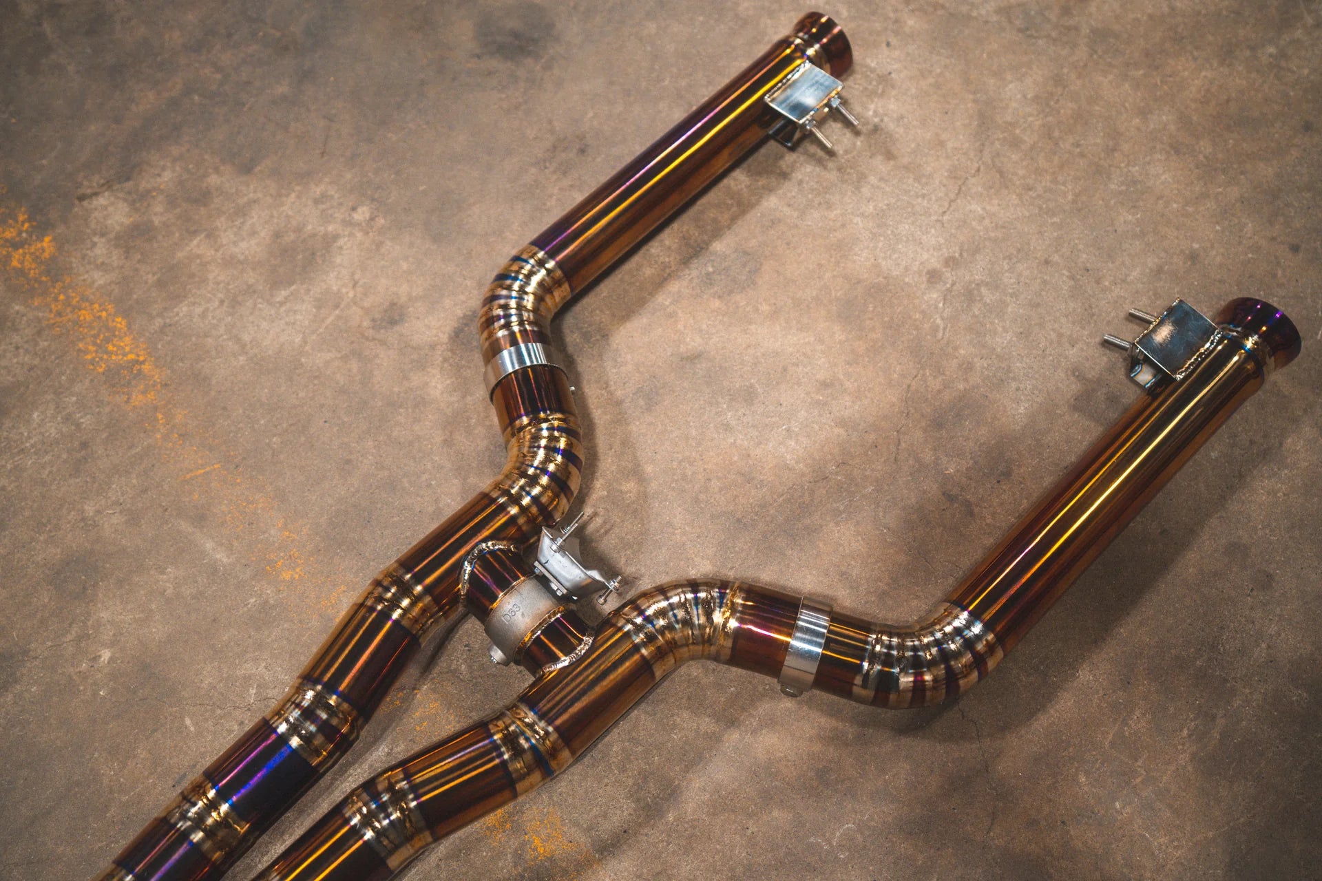 End of the Valvetronic Designs Mercedes W205 C63 / C63S Valved Sport Exhaust System Angled View