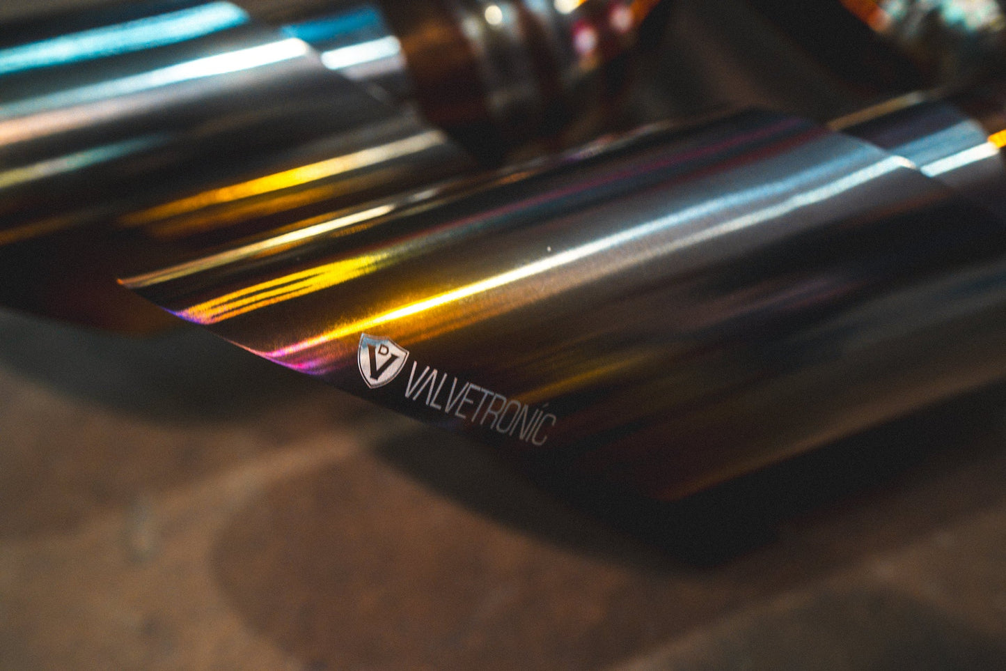 Closeup of the tips of the Valvetronic Lamborghini Urus Valved Sport Exhaust System in titanium