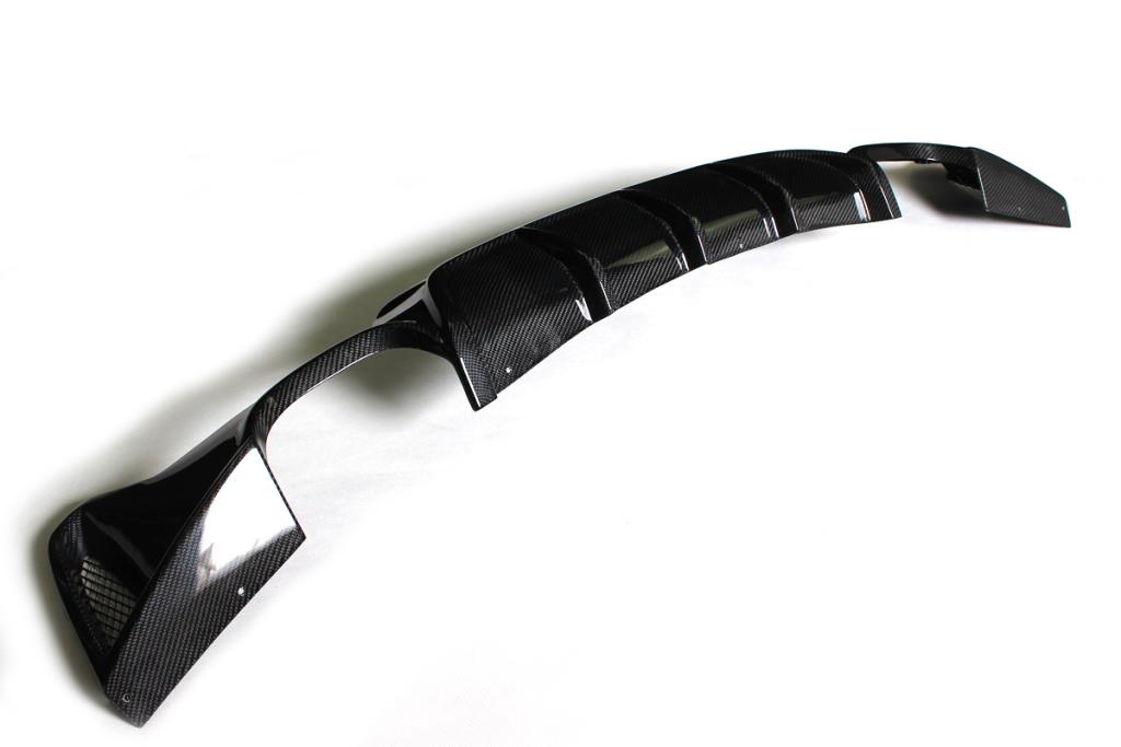 Angled View of the Ventilated Dual Outlet Carbon Fiber Rear Diffuser for BMW F32 (2014-2020) with M Sport