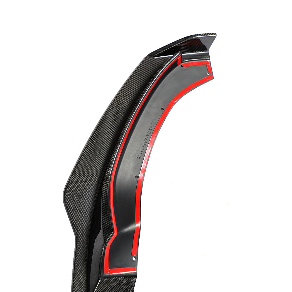 A carbon fiber front lip designed for BMW F32, featuring a black weave pattern with red accents along the lower edge.