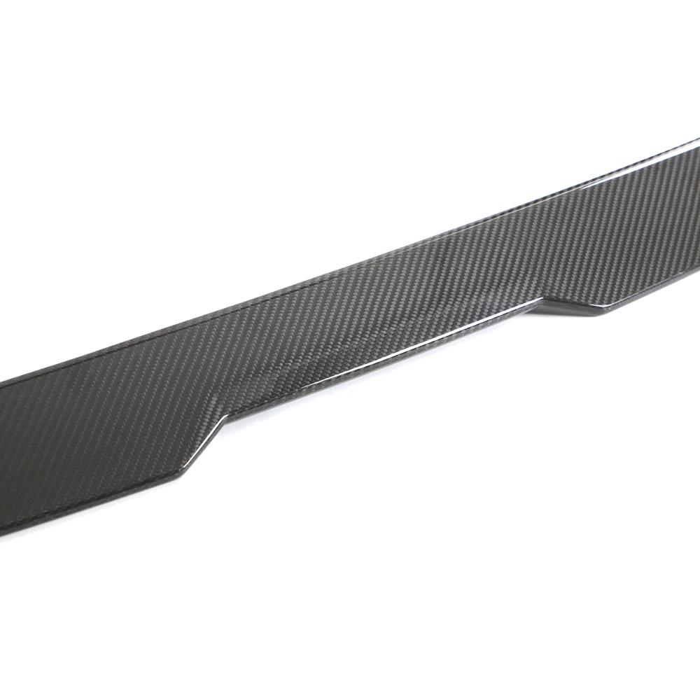 Close up detail of MP Style carbon fiber trunk spoiler weave on BMW G87.
