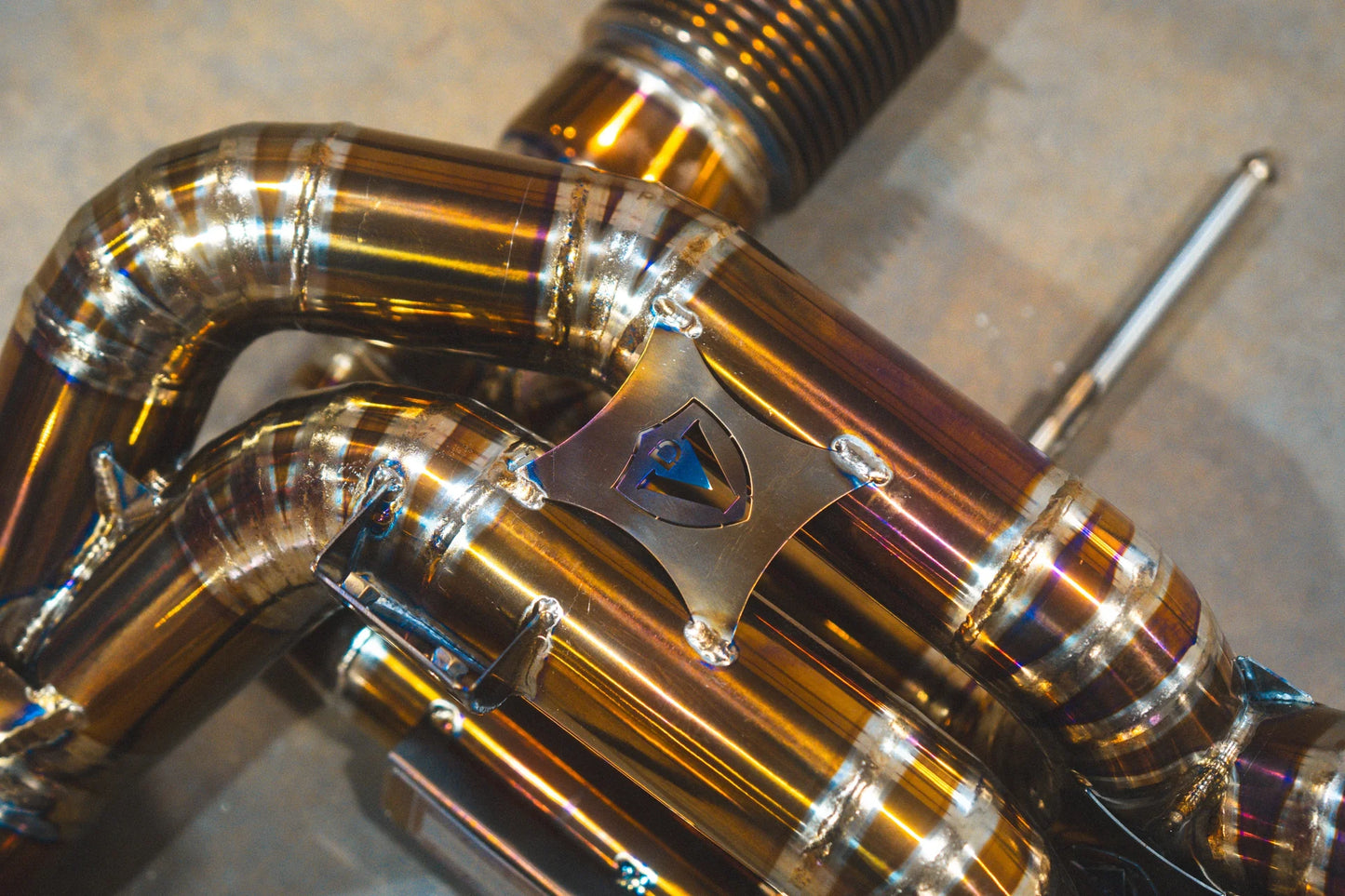 Logo on the Valvetronic Mclaren 720S Valved Sport Exhaust System
