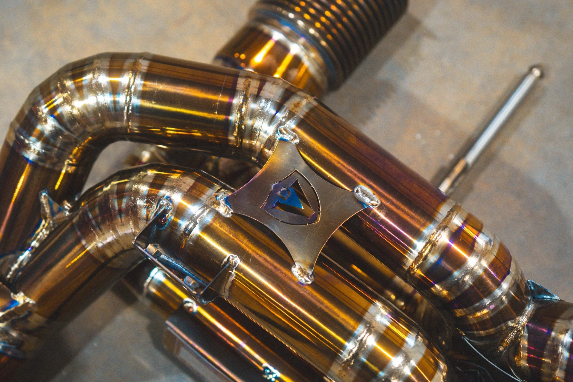 Logo on the Valvetronic Mclaren 720S Valved Sport Exhaust System