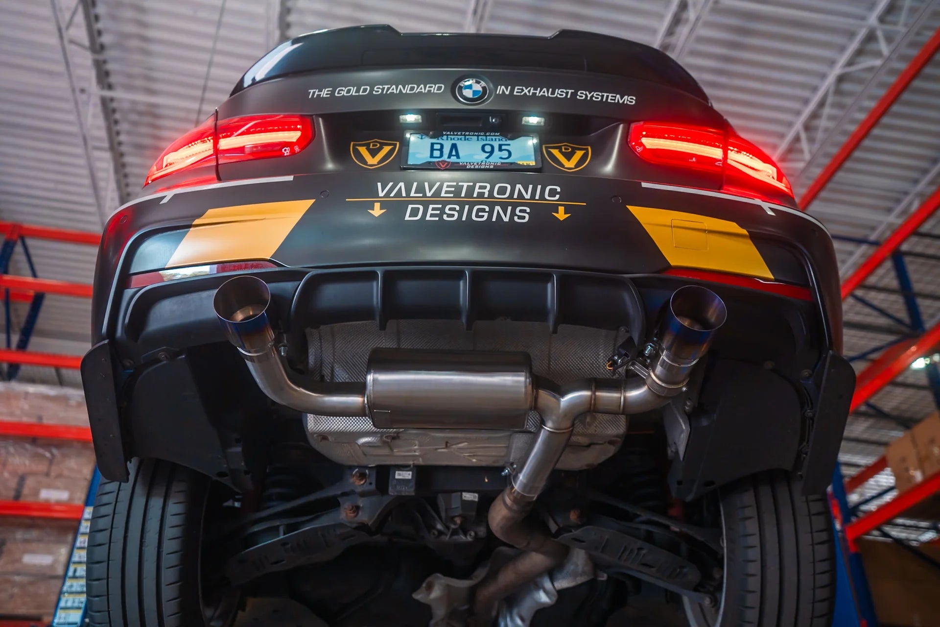 Undercarriage View of BMW F30 F22 F36 F32 Valved Sport Exhaust Axleback.
