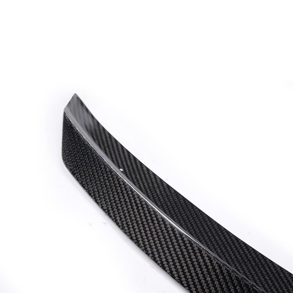 Closeup of the side of the IMS Style Carbon Fiber Trunk Spoiler for Mercedes-Benz C-Class W205 (2015-2021)