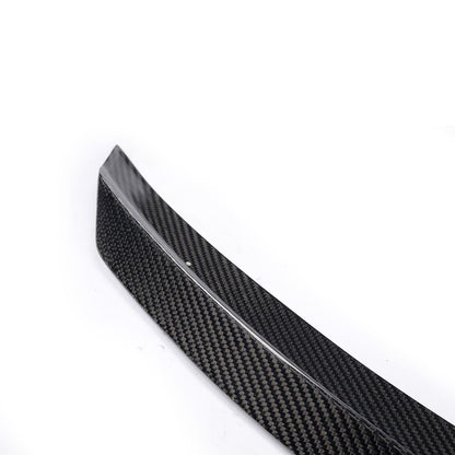 Closeup of the side of the IMS Style Carbon Fiber Trunk Spoiler for Mercedes-Benz C-Class W205 (2015-2021)