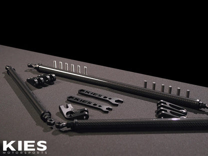 Angled view of the KIES Executive Line G8x S58 Carbon Fiber Strut Brace | G80, G81 M3, G82, G83 M4, G87 M2