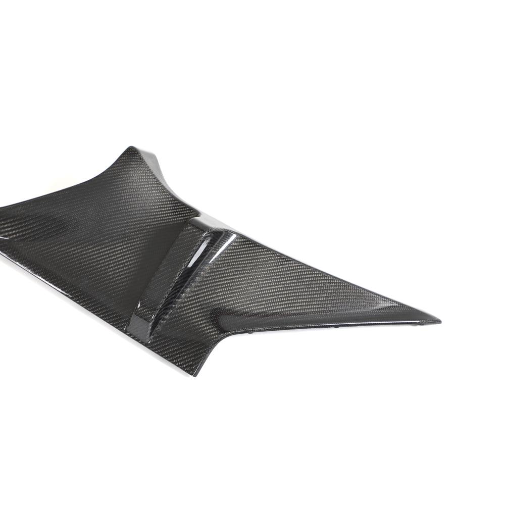 Closeup of the piece of the M4 Style Dry Carbon Fiber Rear Diffuser for BMW M2 G87