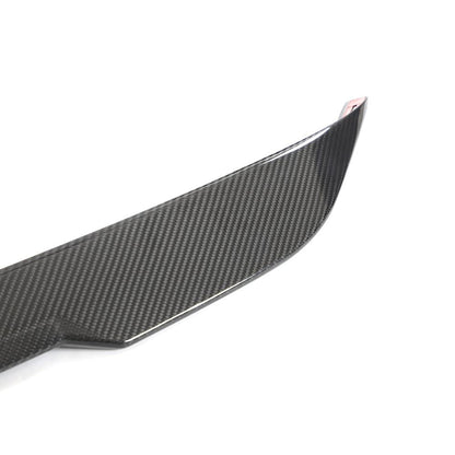 Close up detail of MP Style carbon fiber trunk spoiler weave on BMW G87.