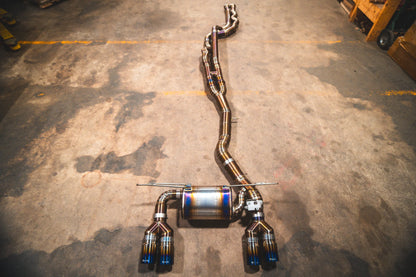 Full view of the titanium version of the Valvetronic BMW F8x M3 / M4 Equal Length Valved Sport Exhaust System | Insignist Motorsports