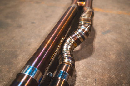 Closeup of the welding on the titanium pipes for the Valvetronic BMW F8x M3 / M4 Equal Length Valved Sport Exhaust System | Insignist Motorsports