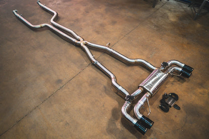 Angled chrome view of the Valvetronic BMW G30 M550I Valved Sport Exhaust System