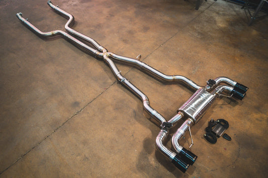 Angled chrome view of the Valvetronic BMW G30 M550I Valved Sport Exhaust System