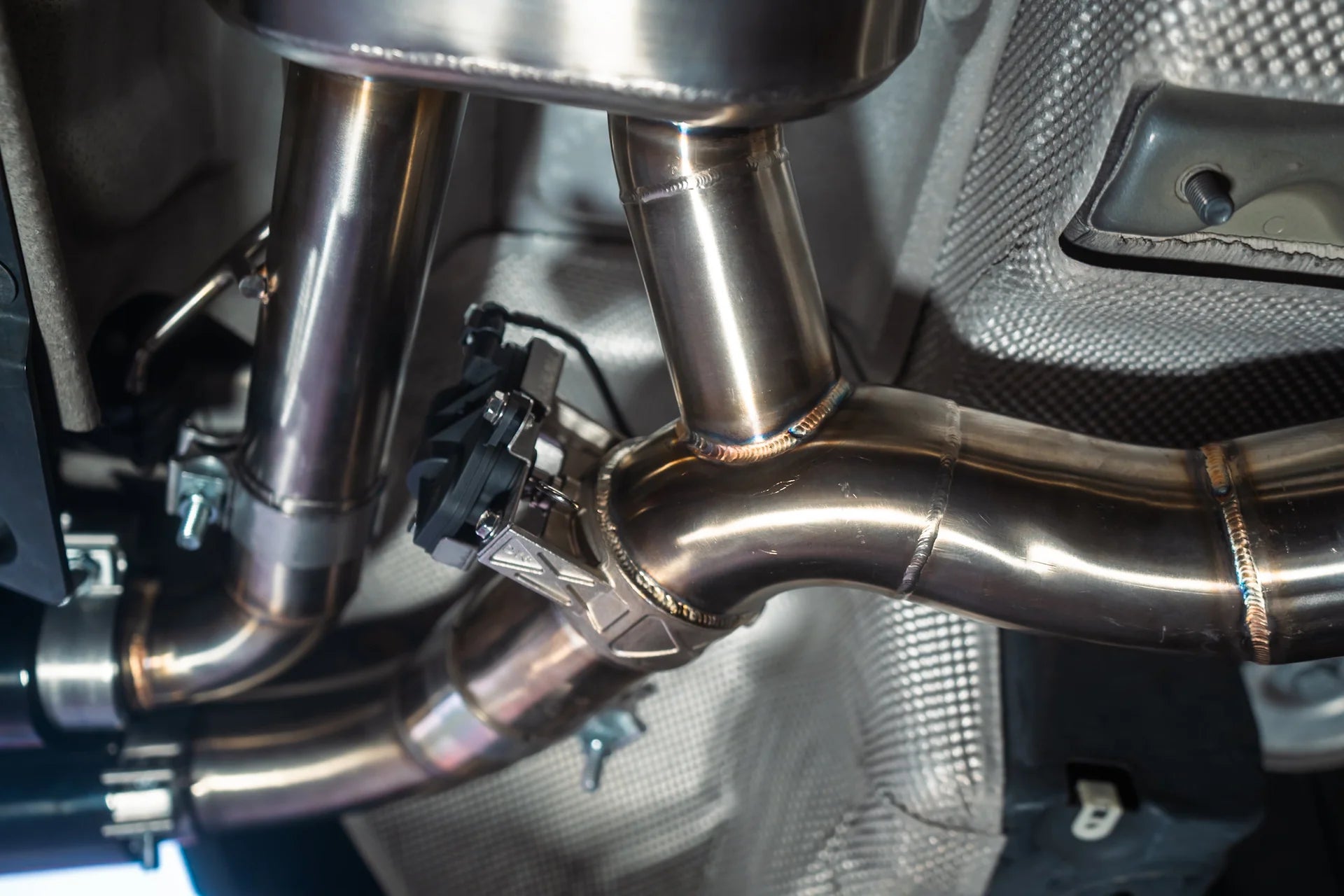 Chrome Welding installed on the Valvetronic BMW G30 M550I Valved Sport Exhaust System