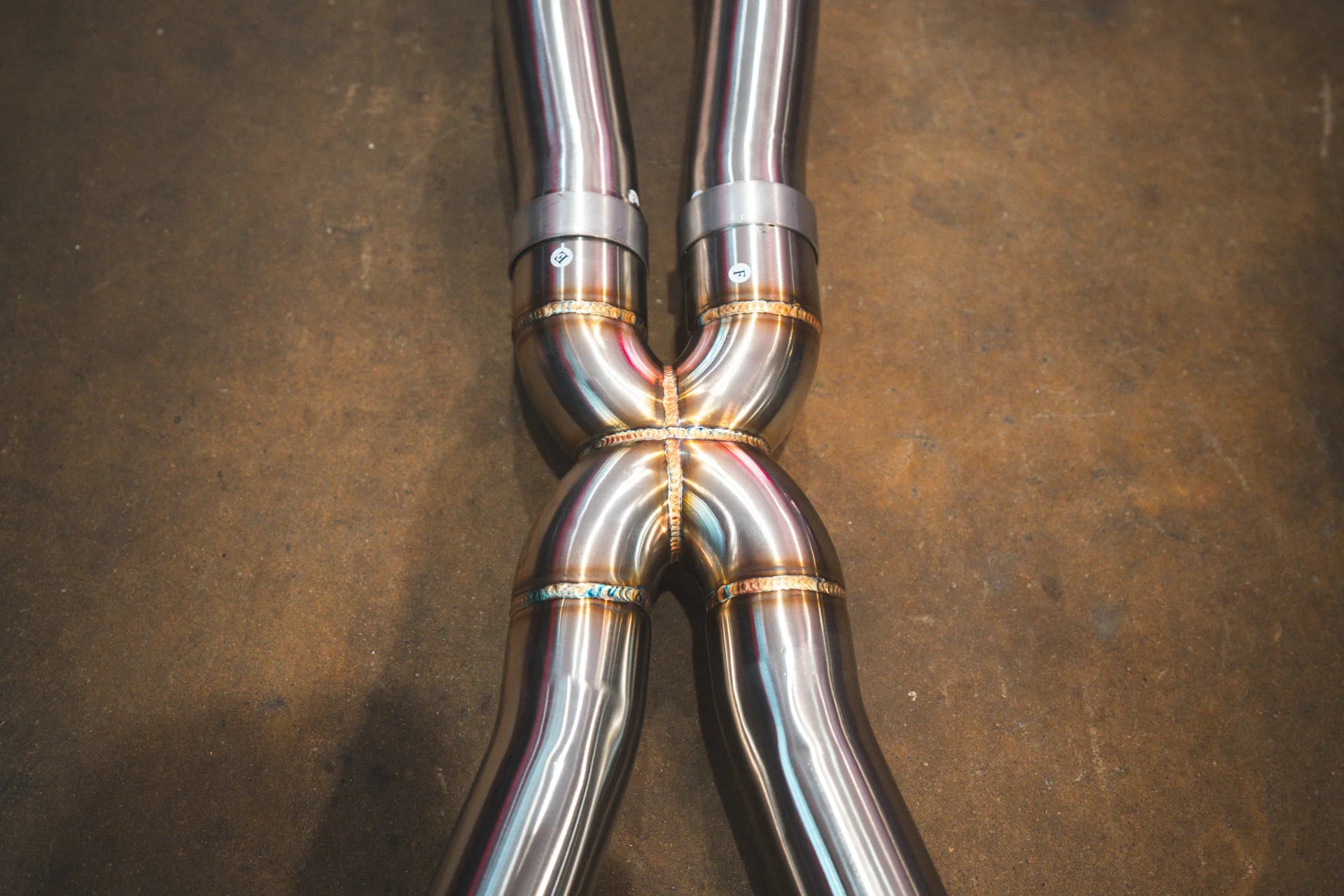 Closeup of the welding on the Valvetronic BMW G30 M550I Valved Sport Exhaust System