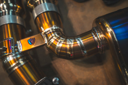Another angled view for the Valvetronic BMW G8x M3 / M4 Valved Sport Exhaust System | Insignist Motorsports in titanium 