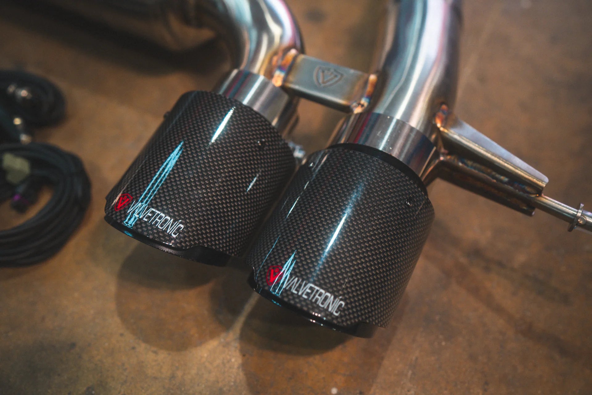 Closeup of the Carbon Tips on the Valvetronic BMW G8x M3 / M4 Valved Sport Exhaust System | Insignist Motorsports