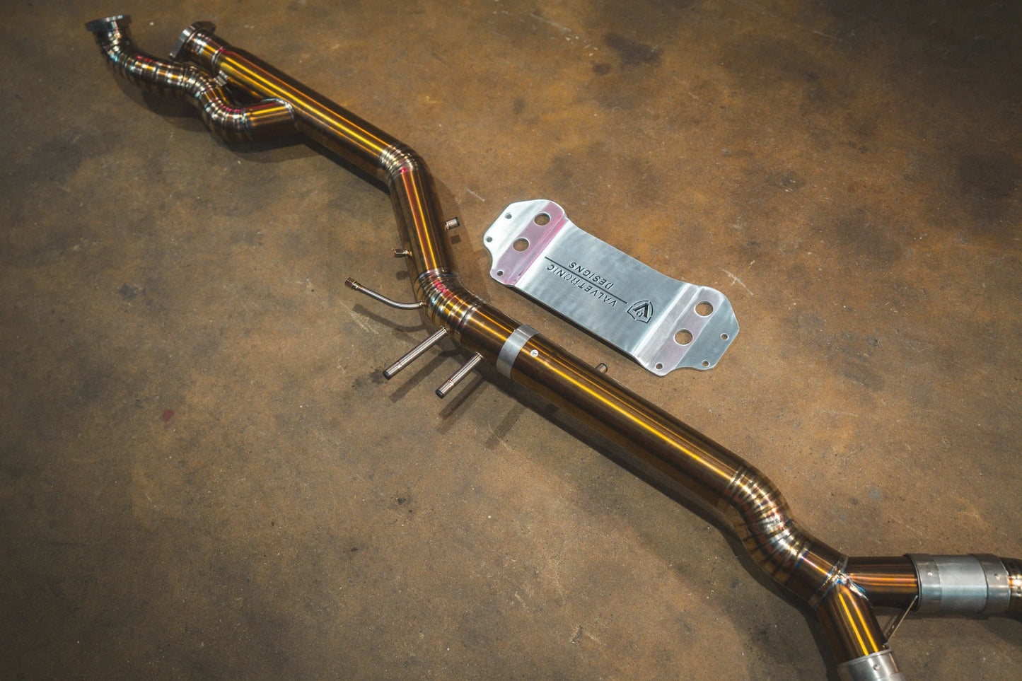 End Pipe view of the y pipe in titanium for the Valvetronic BMW G8x M3 / M4 Valved Sport Exhaust System | Insignist Motorsports