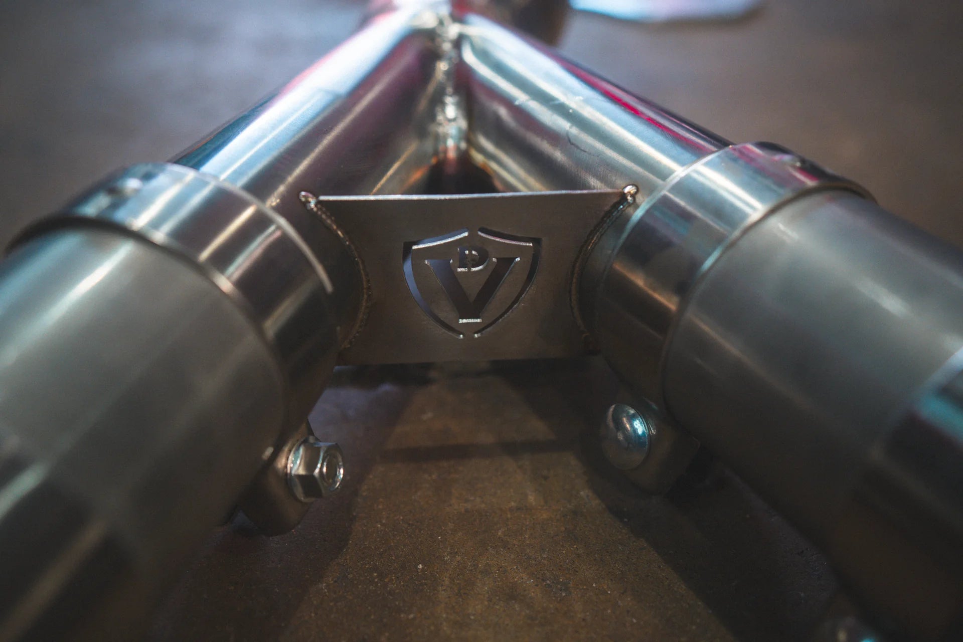 View from the middle of the Valvetronic BMW G8x M3 / M4 Valved Sport Exhaust System | Insignist Motorsports