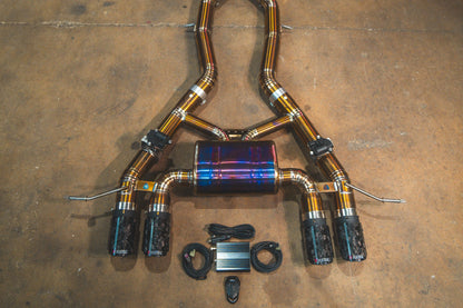 Forged Carbon tips on the Valvetronic BMW G8x M3 / M4 Valved Sport Exhaust System | Insignist Motorsports in titanium