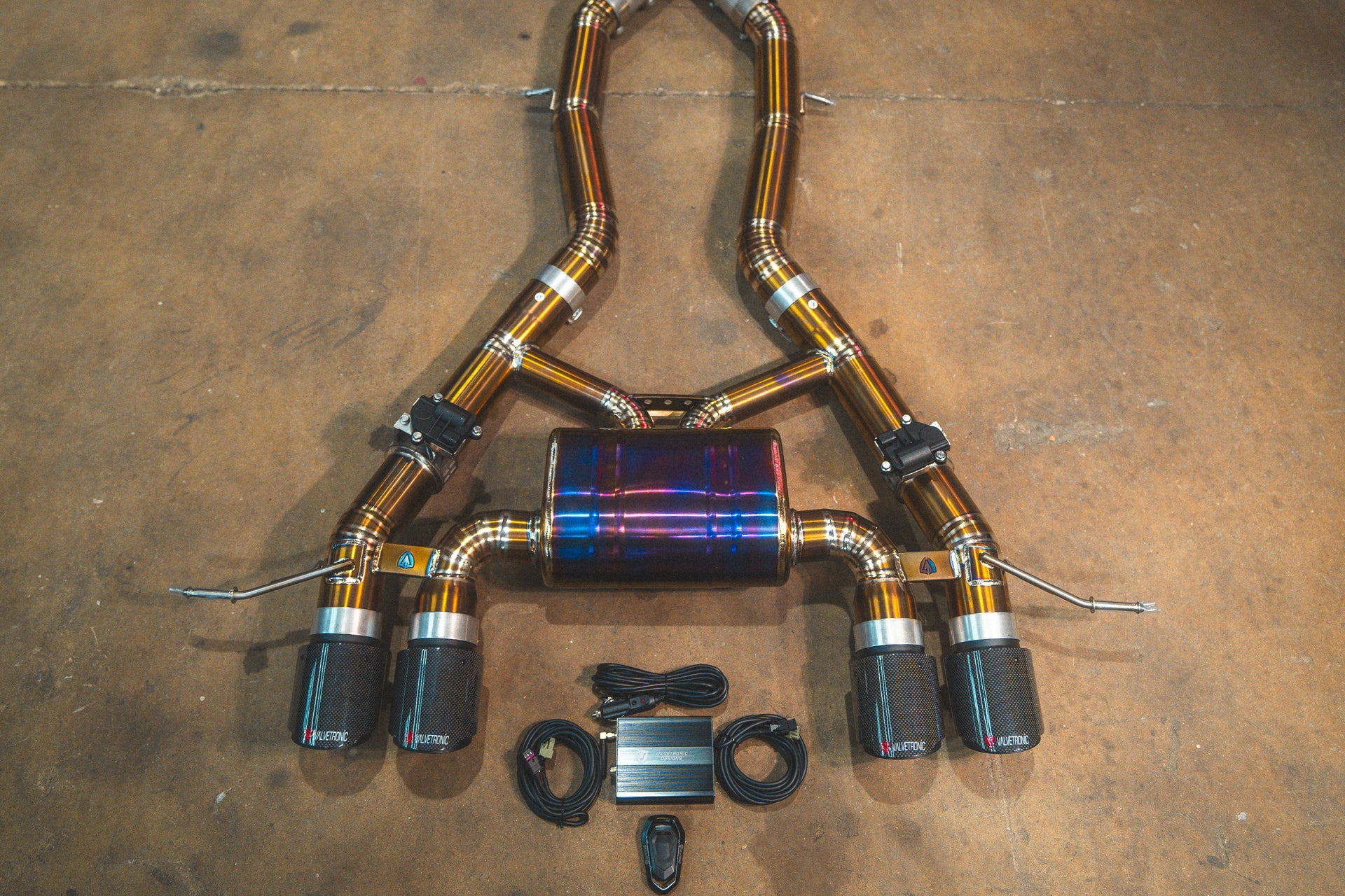 Titanium end closeup of the Valvetronic BMW G8x M3 / M4 Valved Sport Exhaust System | Insignist Motorsports
