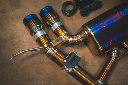 Side closeup on the titanium tips for the  Valvetronic BMW G8x M3 / M4 Valved Sport Exhaust System | Insignist Motorsports