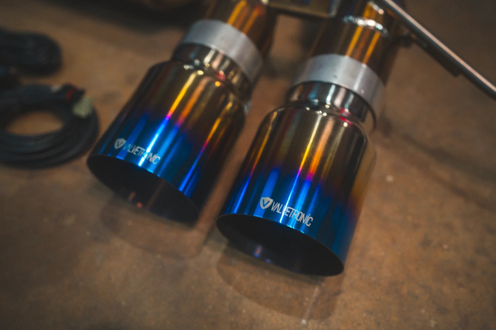 Closeup of the titanium tips for the Valvetronic BMW G8x M3 / M4 Valved Sport Exhaust System | Insignist Motorsports