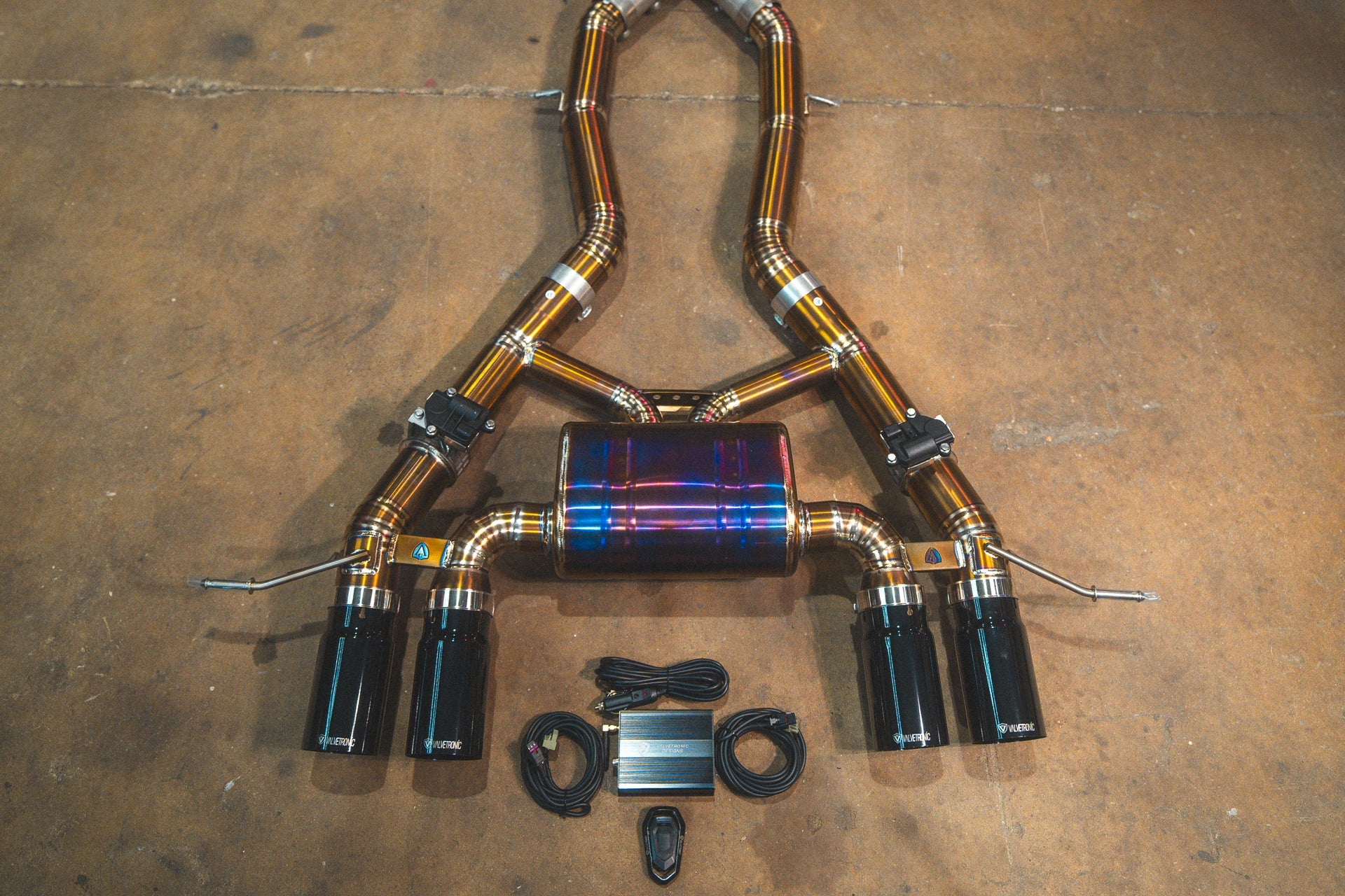 Black tips on the Valvetronic BMW G8x M3 / M4 Valved Sport Exhaust System | Insignist Motorsports in titanium 