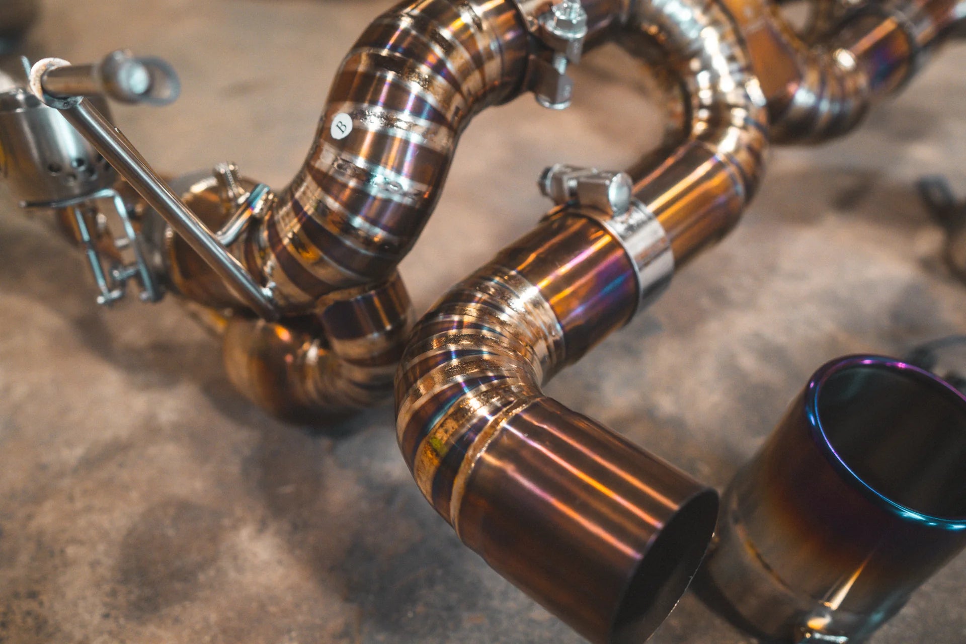 Tip closeup of the Valvetronic Ferrari F8 Valved Sport Exhaust System