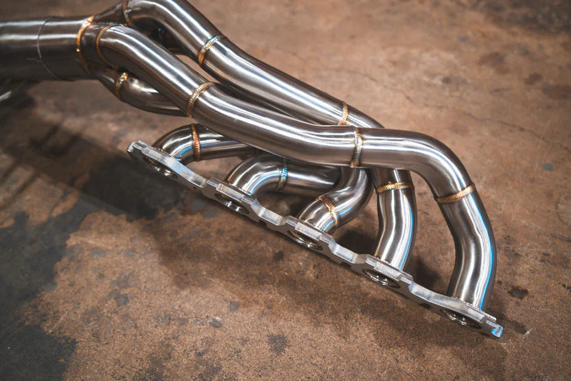 Closeup on the pipes for the Valvetronic Lamborghini Huracan Performante / EVO / STO / Tecnica True F1 / Valved Exhaust System