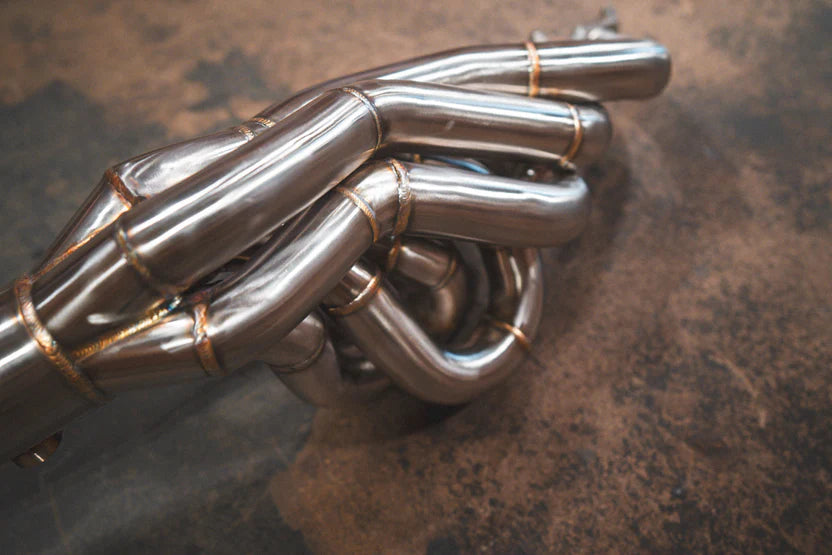 Closeup on the pipes for Valvetronic Lamborghini Huracan Performante / EVO / STO / Tecnica True F1 / Valved Exhaust System