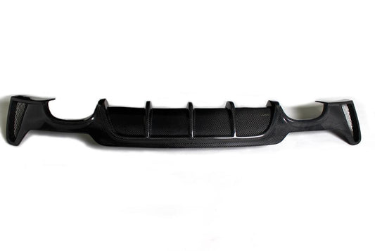 Carbon fiber rear diffuser for BMW F32 with a ventilated design and dual outlet configuration.