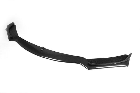 A carbon fiber front lip designed for BMW F32 models, featuring a glossy black finish.