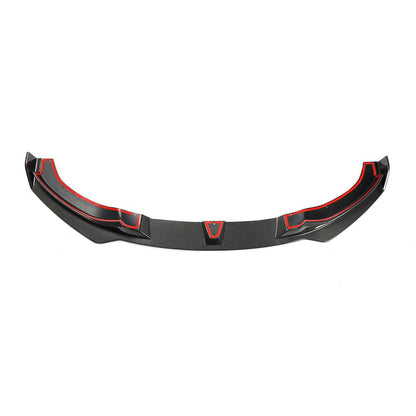 A carbon fiber front lip designed for BMW F32, featuring a black weave pattern with red accents along the lower edge.